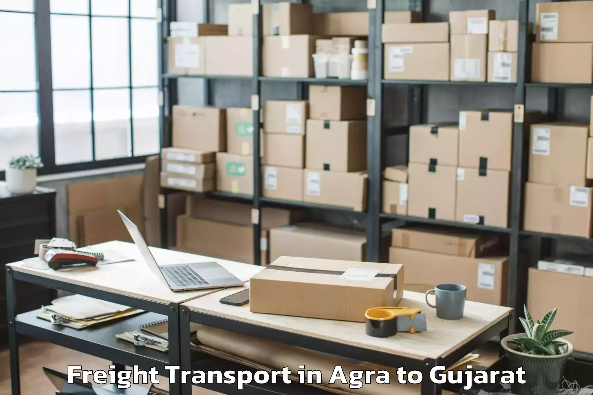 Top Agra to Dhoraji Freight Transport Available